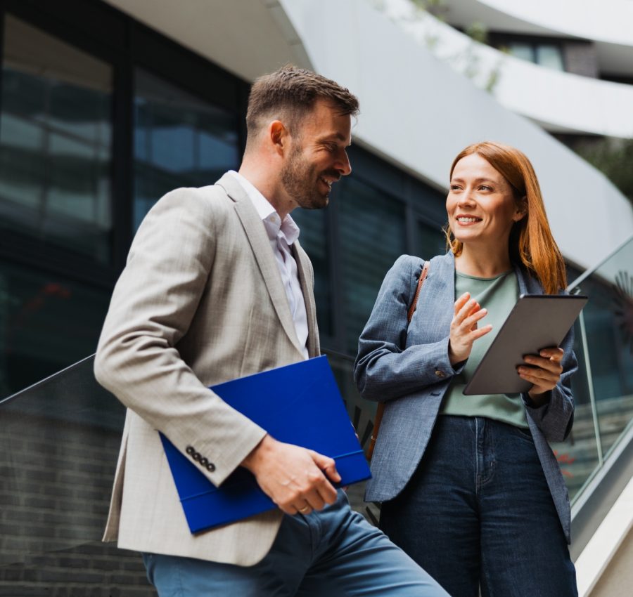 Two,Business,Colleagues,Having,A,Professional,Discussion,Outside,An,Office